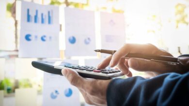business-finance-man-calculating-budget-numbers-invoices-financial-adviser-working