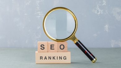 conceptual-seo-analysis-business-with-wooden-blocks-with-words-it-magnifying-glass-side-view