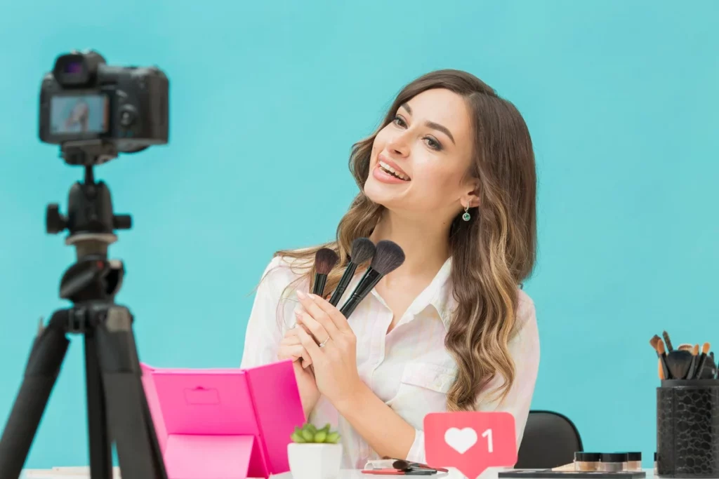 beautiful-woman-recording-make-up-video